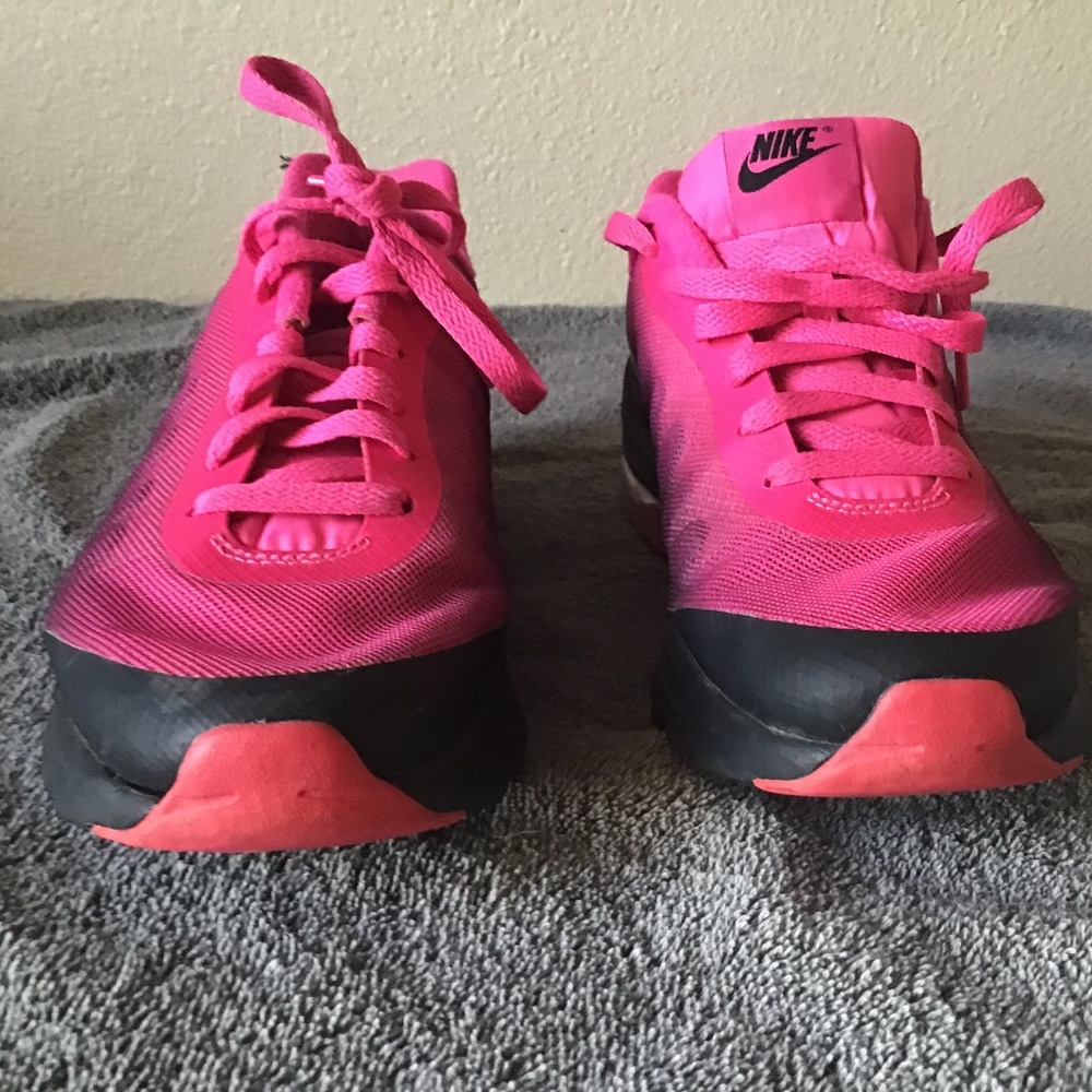 Pink and black nike air